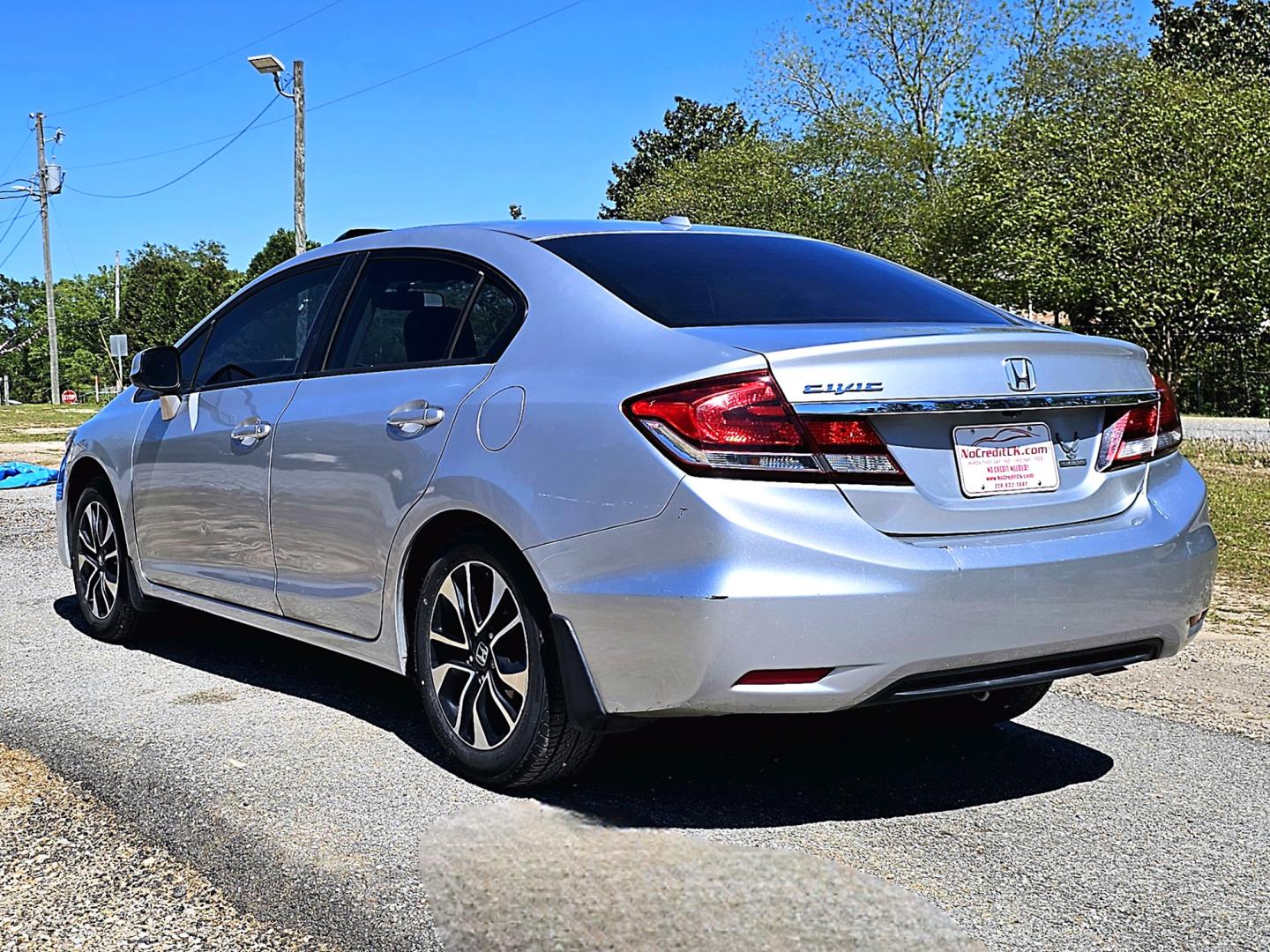 2013 Silver Honda Civic EX-L Sedan 5-Speed AT (2HGFB2F94DH) with an 1.8L L4 SOHC 16V engine, 5-Speed Automatic transmission, located at 18001 Kellogg Rd, Saucier, MS, 39574, (228) 832-1441, 139.421463, -76.641457 - Photo#7